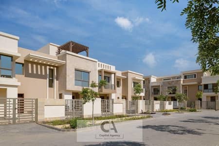 A villa for sale in Sarai, Madinat Misr, with a 50% cash discount or installments over 12 years with 0% down payment, in the heart of Mostakbal City |