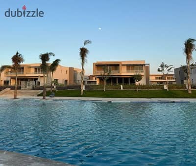 Inspect and receive immediately a twin house villa in October, next to New Giza, with a Pyramids view, in Al Hadaba Compound.