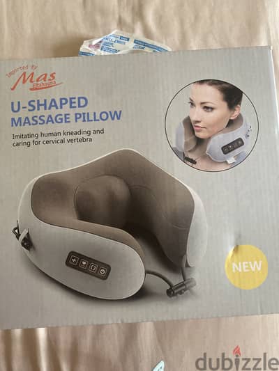 Massaging neck pillow U-shaped