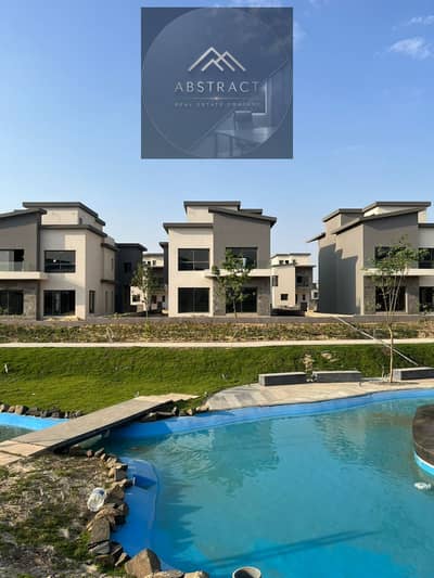 ready to move villa for sale with a stunning view overlooking the Landesecap near Cairo International Airport in Creek Town New Cairo Prime location