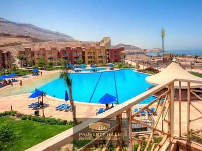 Furnished chalet for sale, 3 rooms in Porto Sokhna, sea view on the lagoon next to La Vista and Al-Jalala.