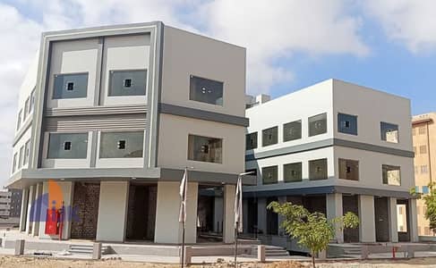 Commercial shop for sale, immediate occupancy, ground floor, in Al-Hurriya neighborhood, next to the automated bakery and health center, in the heart