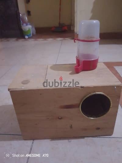 bird nesting boxes and water dispenser