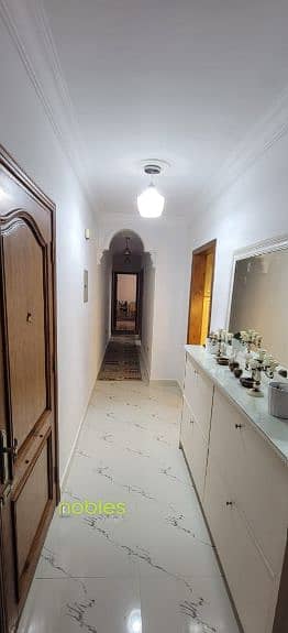 Apartment, garden, super luxe finishing, prime location near North 90th and Mohamed Naguib Axis in Al Banafseg Buildings, Fifth Settlement