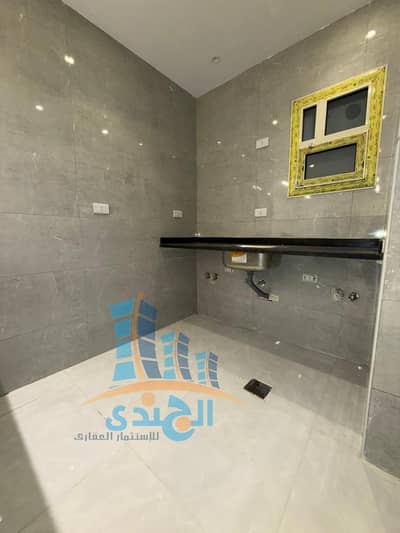 A very distinctive apartment for sale in the Pyramids Gardens, area 100 meters, ground floor side with side garden in the third gate, area P, one of the most distinctive areas, the third gate, two bedrooms and two bathrooms