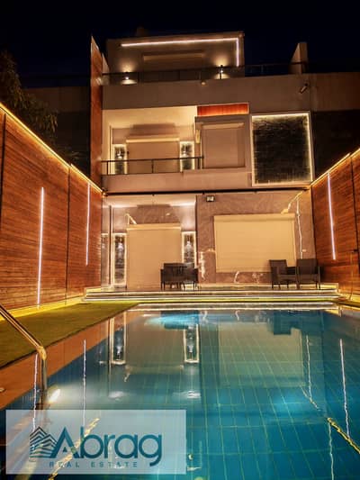 Townhouse for sale in Zayed Dunes Compound, Sheikh Zayed. Features a swimming pool, kitchen, and air conditioning; ultra-super-lux finish.