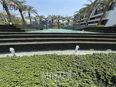 شقة بحديقة خاصة بموقع مميز للبيع متشطبة بالكامل في واتر واي 1 القاهرة الجديدة