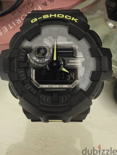 ساعه  gshock اخضر و اسود GA