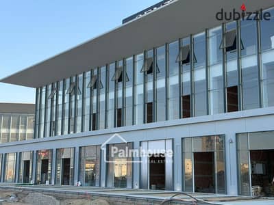 Commercial store for sale directly on Dahshur Link (the strongest commercial axis in 6 October)