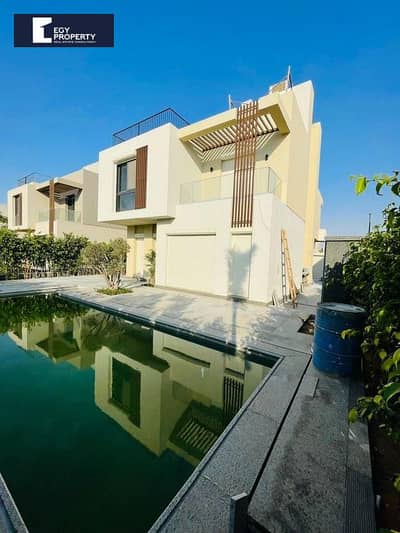 Super Lux Fully Finished villa with Private pool in a very prime location within the SODIC East compound with an open view of landscaping,