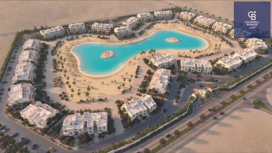 Fully finished 2-bedroom chalet with A/C included—direct view of the Crystal Lagoon—by Hassan Allam (Swan Lake, El Gouna, Red Sea). 5% down payment on