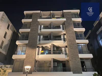 Apartment for sale with installments over 12 years, featuring a distinctive open view in the best location in New Cairo.