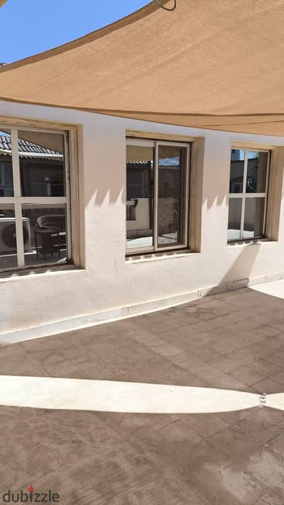 A furnished, air-conditioned one-bedroom apartment with a roof in Al-Yasmeen Compound, Sheikh Zayed