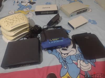 مجموعة اكسس بوينت  tplink  و linksys  ومجموعة سويتش  و wlan