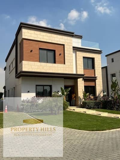 Villa for Sale with Landscape View in Azar Compound, New Cairo  A premium villa overlooking beautifully landscaped greenery in Azar Compound