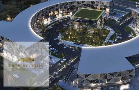 مطلوب 10%وهتمتلك محل تجاري بجراج في Prk vie وبكامل التشطيبات في التجمع
