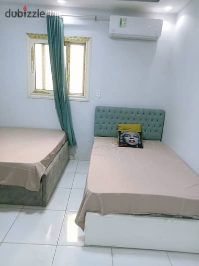 Furnished studio apartment for rent 6 Al Hayy Al Awwal steps to the parking lot, Al Hasri, and the university steps to Mall Egypt, one-third of an hour to Hyper and Zaid