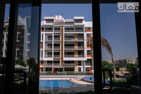 Own your apartment near AUC in the heart of New Cairo at the lowest total price with installments up to 6 years