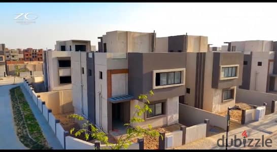 Villa for sale in a compound on Dahshur Road in front of Beverly Hills Zayed with installments directly from the owner in a high-end compound