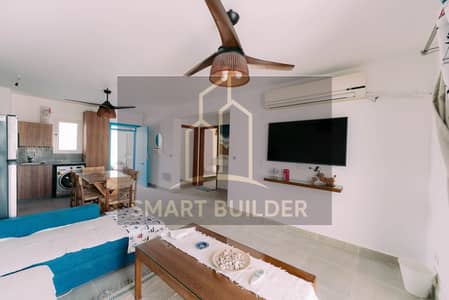 Chalet for sale in Barros Mountain View, Ras El Hikma, North Coast with ultra super lux finishing, furniture, appliances, and air conditioning overlooking the swimming pool and jacuzzi