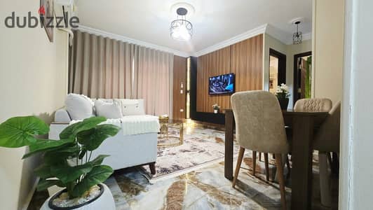 Furnished apartment for rent in Madinaty B7, special ultra-super-lux finishing, double view, wide garden, and fully air-conditioned.