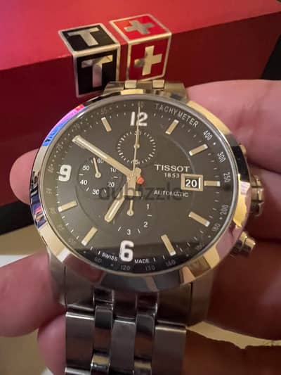 ساعة tissot سويسري اصلية اوتوماتيك تعمل بالنبض بالضمان والفاتورة