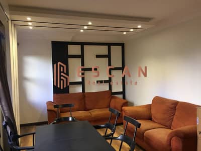 136 sq m ground floor apartment with garden for sale in Al Rehab, prime location near services