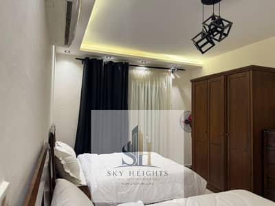 Furnished 3-bedroom, 2-bathroom apartment for rent in Al Rehab City; features modern furniture and a prime location.
