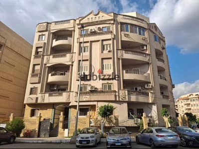 Duplex for sale in Al-Narges Apartments, 275 sqm, with a 120 sqm garden.