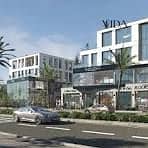 Shop for sale 28m on Central Street, 6th of October City, with 40% construction completed and a 10-year installment plan.
