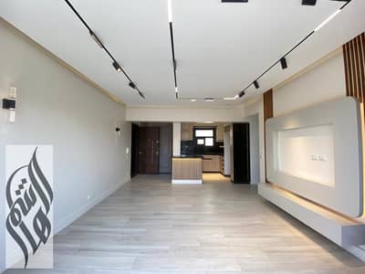 Apartment for sale in Madinaty, 105 SQM, 2 bedrooms, premium finishing, open view, corner unit, north-facing, located in B15.
