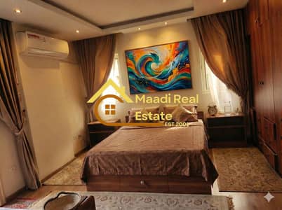 Apartment for sale in Sarayat Al Maadi, super deluxe finish. The sale includes furniture and air conditioners. It has 2 bedrooms and 2 bathrooms .