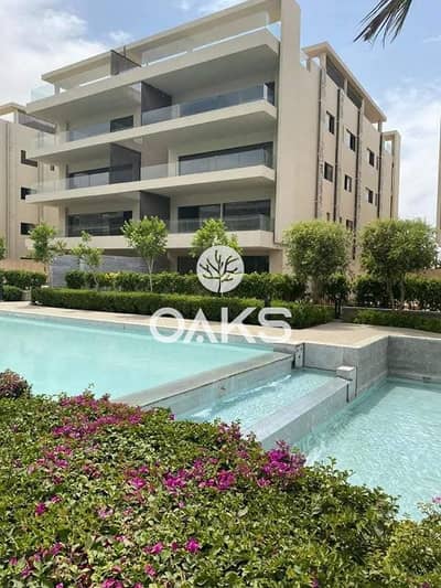 Apartment with garden for sale fully finished form Hassan Allam  Swanlake residences in the heart of El Tagamoa  installments over 10 years