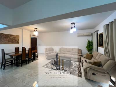 Furnished apartment for rent in Al Rehab, Phase 5, 129 sq m, 2 bedrooms, 2 bathrooms, wide garden view, near services, markets, and banks. A great dea