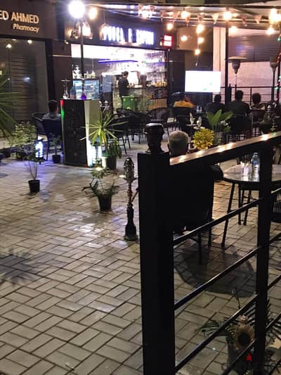 A cafe or restaurant furnished and finished in the Elite Investors Mall, the Southern area, in the Fifth Settlement.