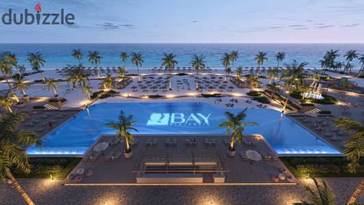 Own a chalet with a sea view in the Q Bay project by developer Sherif Haleiwa, in a prime location at kilometer 92 on the North Coast.