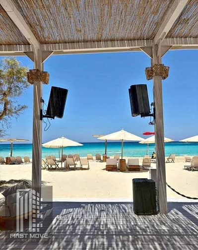 Chalet for sale in D-BAY, North Coast—situated in a prime location in Ras El Hekma with a sea view—offered with flexible installments and the lowest d