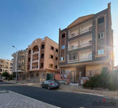 Two adjacent apartments for sale, 135m in السياحية, 6th of October, on the main road, in front of خير زمان, next to الشربتلي Mosque and the mall. Immediate delivery, cash 1,950,000 for the apartment.
