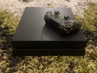 Playstation 4 (Fat) 1 TB with a new controller