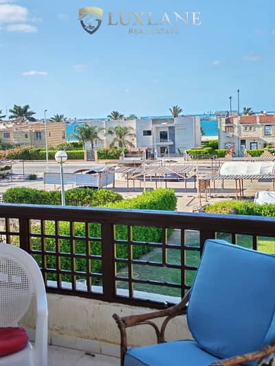 Available for rent: 4-bedroom villa, second row by the sandy lake, Marina 4, North Coast, El Alamein
