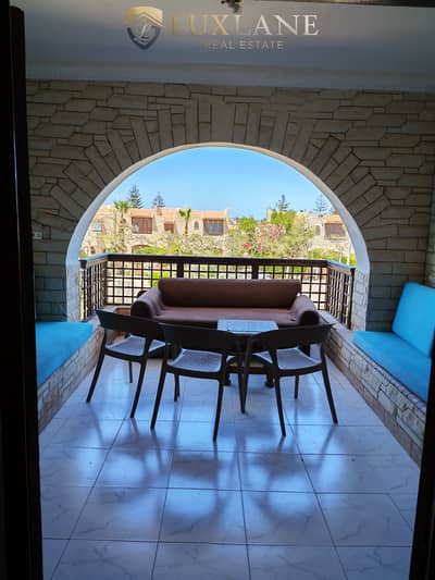 Available for rent, a chalet with two bedrooms, second row by the lake, air-conditioned, in Marina 5, North Coast, Alamein