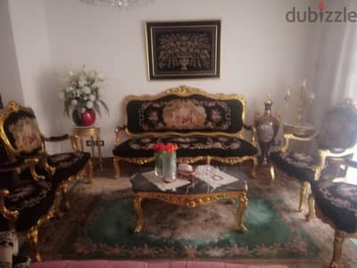صالون ابيسون رسمة مرضعه كنبه و٤ كراسي وطربيره في الوسط اللون الاسود