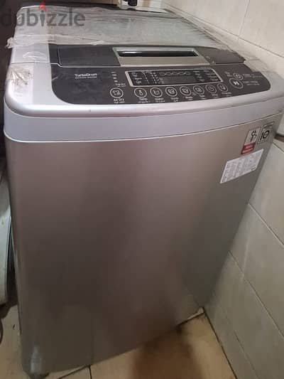 بسعر لقطة. . غسالة ١٣ ك LG تحميل علوي. . سيلفر. . موفر جدا للكهرباء