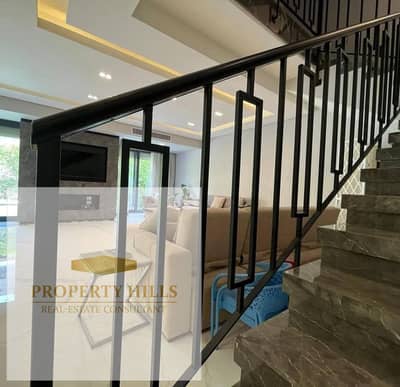 Standalone villa for sale at half price in a prestigious Azar compound.
