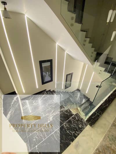 Standalone villa for sale at half price in a prestigious Azar compound.