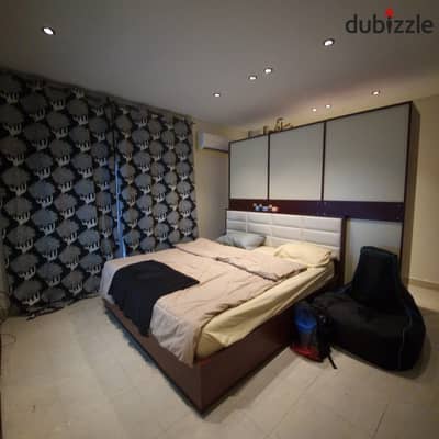 An exceptional apartment for sale in Madinaty (Phase B1) at a fantastic price; located opposite the Open Air Mall with a garden view.