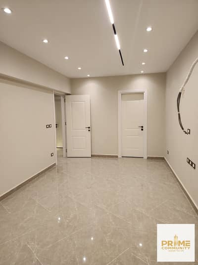 An exceptional deal: a townhouse in the "Kayan" compound—located within the "Grand Heights" complex—featuring installed kitchen cabinetry and air cond