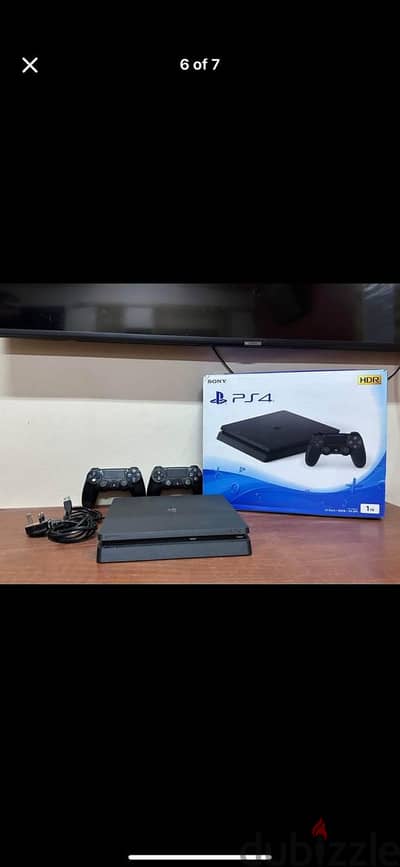 Ps4 slim used like new 1 terabyte