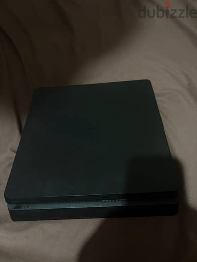 Playstation 4 slim  معاه دراعين و 8 العاب