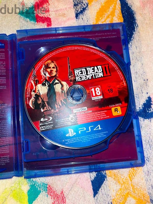 Playstation 4 slim  معاه دراعين و 8 العاب 1